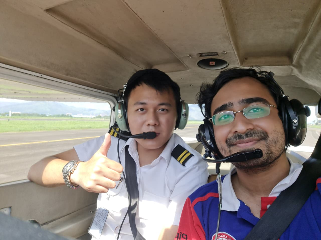 Instructor and student celebrating a training milestone