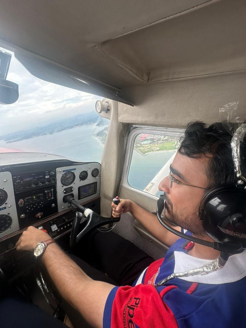 Student pilot flying over the coastline near Subic Bay